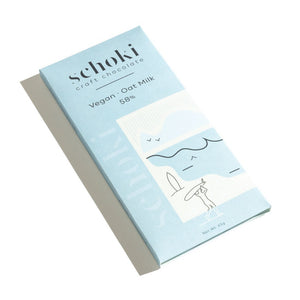 Schoki Chocolate, Oat Milk 58%. Light blue packaging. Ethical bean to bar chocolate handcrafted in Squamish, B.C. 